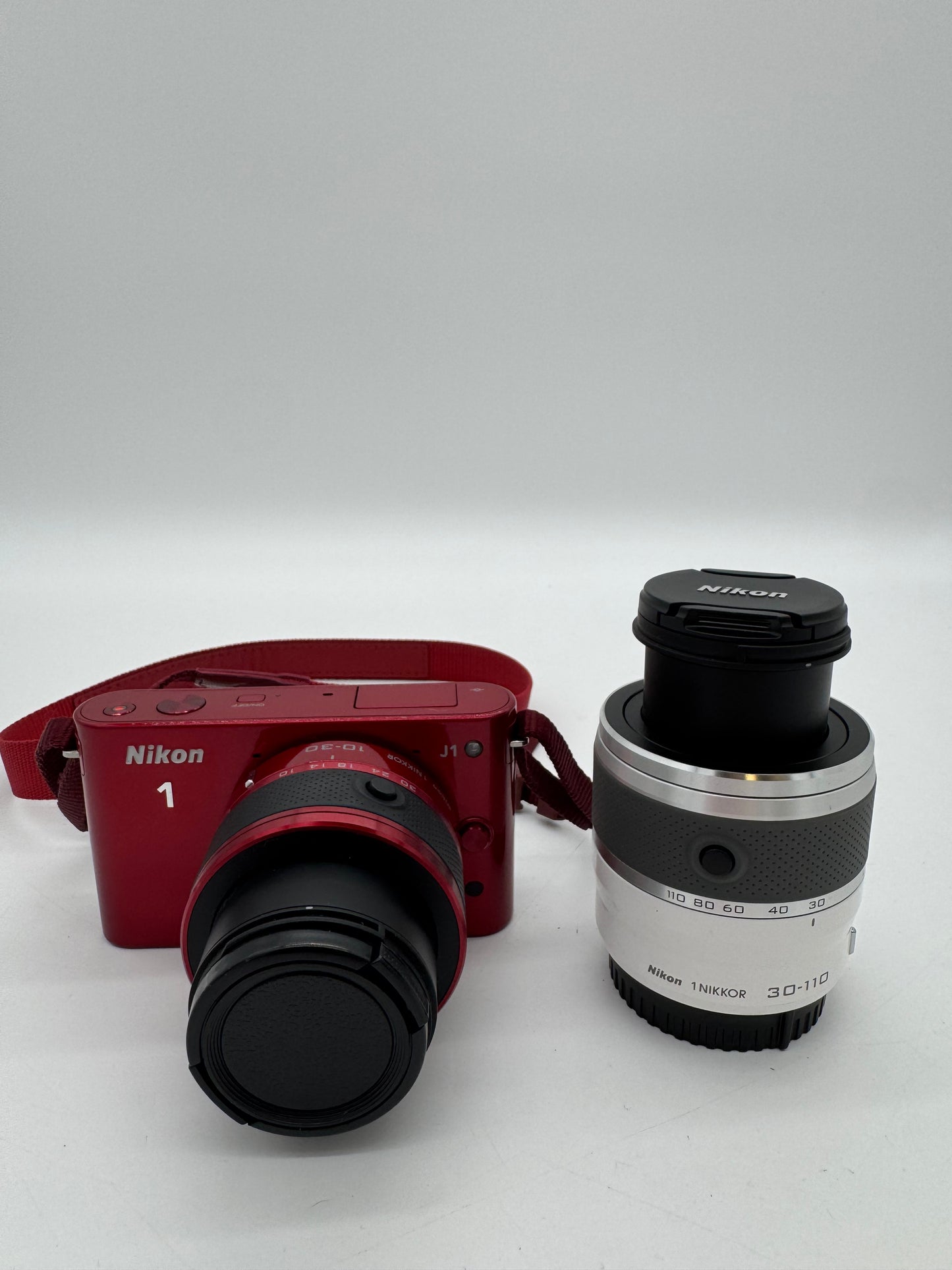 Nikon 1 J1 Red Digital Camera with 2 Lenses and Carry Bag