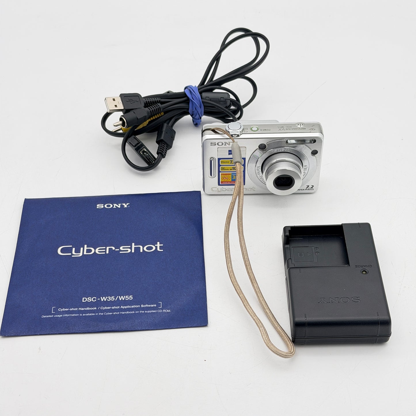 Sony Cyber-Shot DSC-W55 7.2MP Digital Camera Silver Carl Zeiss - Charger Cable CD Bundle