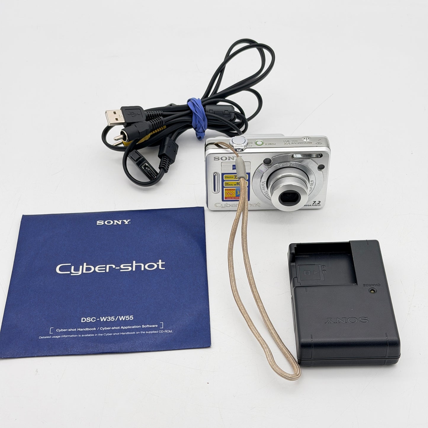 Sony Cyber-Shot DSC-W55 7.2MP Digital Camera Silver Carl Zeiss - Charger Cable CD Bundle