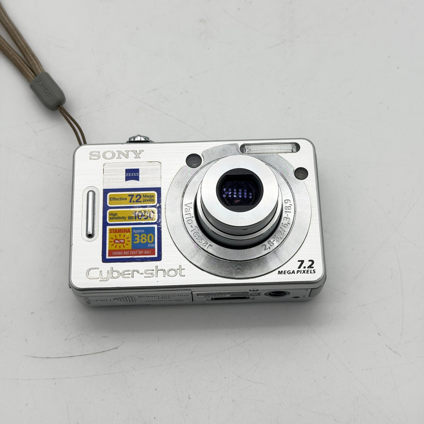 Sony Cyber-Shot DSC-W55 7.2MP Digital Camera Silver Carl Zeiss - Charger Cable CD Bundle