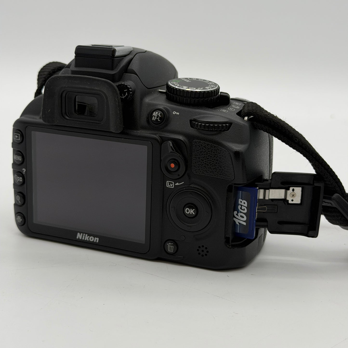 Nikon D3100 14.2MP Digital SLR Camera w/ 18-55mm Lense, and  Bag+Charger